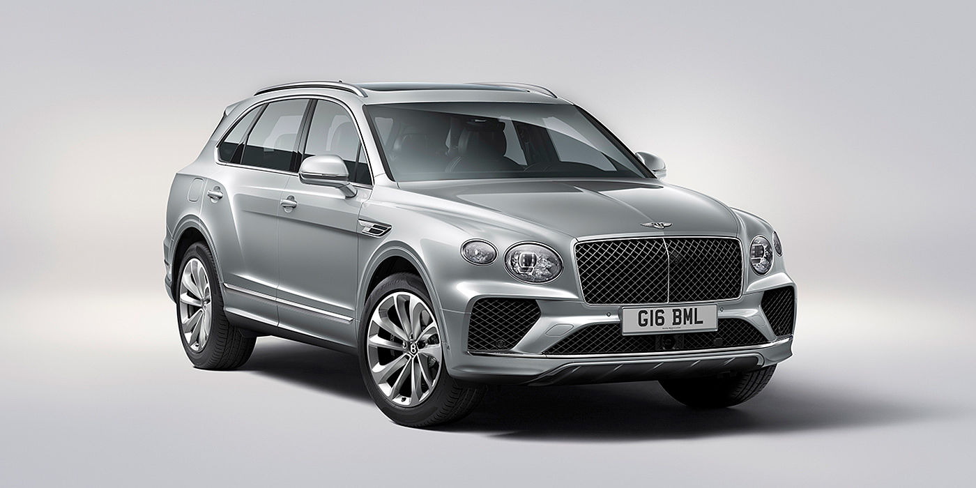 Bentley Johannesburg Bentley Bentayga in Moonbeam paint, front three-quarter view, featuring a matrix grille and elliptical LED headlights.