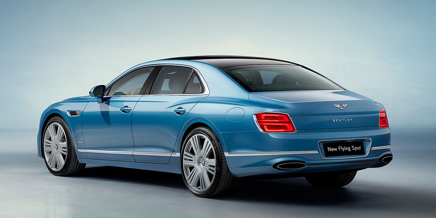 Bentley Johannesburg New Bentley Flying Spur Azure sedan rear view in Light windsor blue by Mulliner paint with 22 inch Azure wheels and chrome exterior details