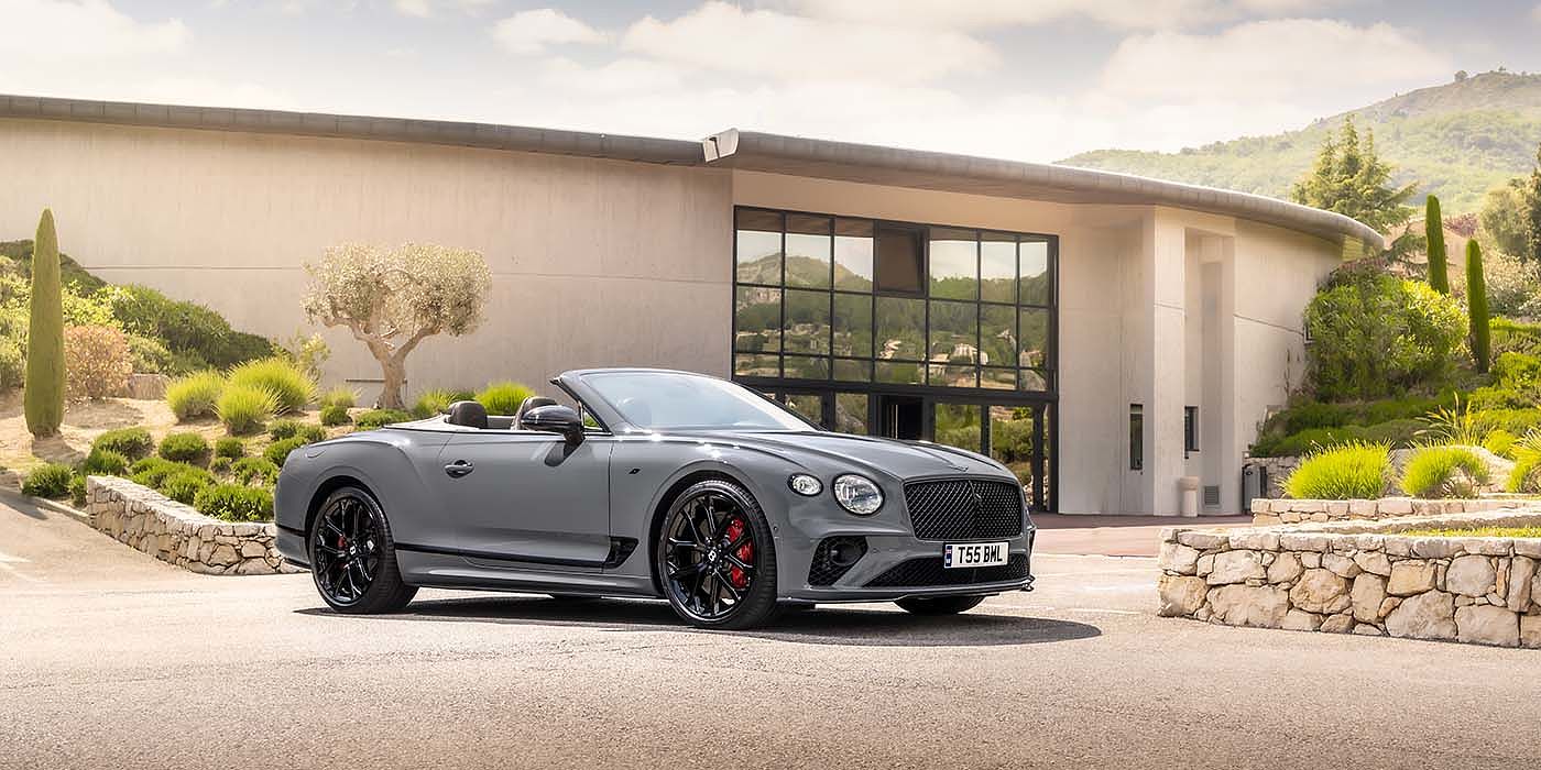 Bentley Johannesburg Bentley Continental GTC S convertible in Cambrian Grey paint front 34 static near house