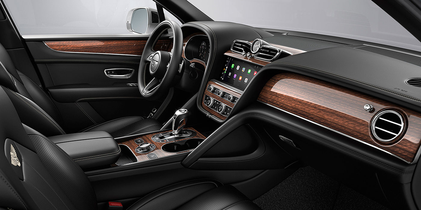 Bentley Johannesburg Bentley Bentayga interior with a Crown Cut Walnut veneer, view from the passenger seat over looking the driver's seat.