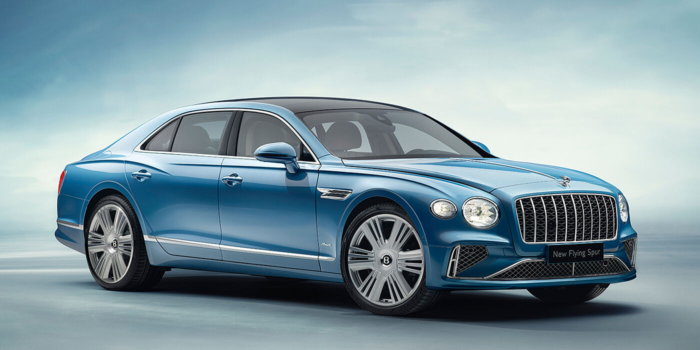 Bentley Johannesburg New Bentley Flying Spur Azure sedan front view in Light windsor blue by Mulliner paint with 22 inch Azure wheels and chrome exterior details