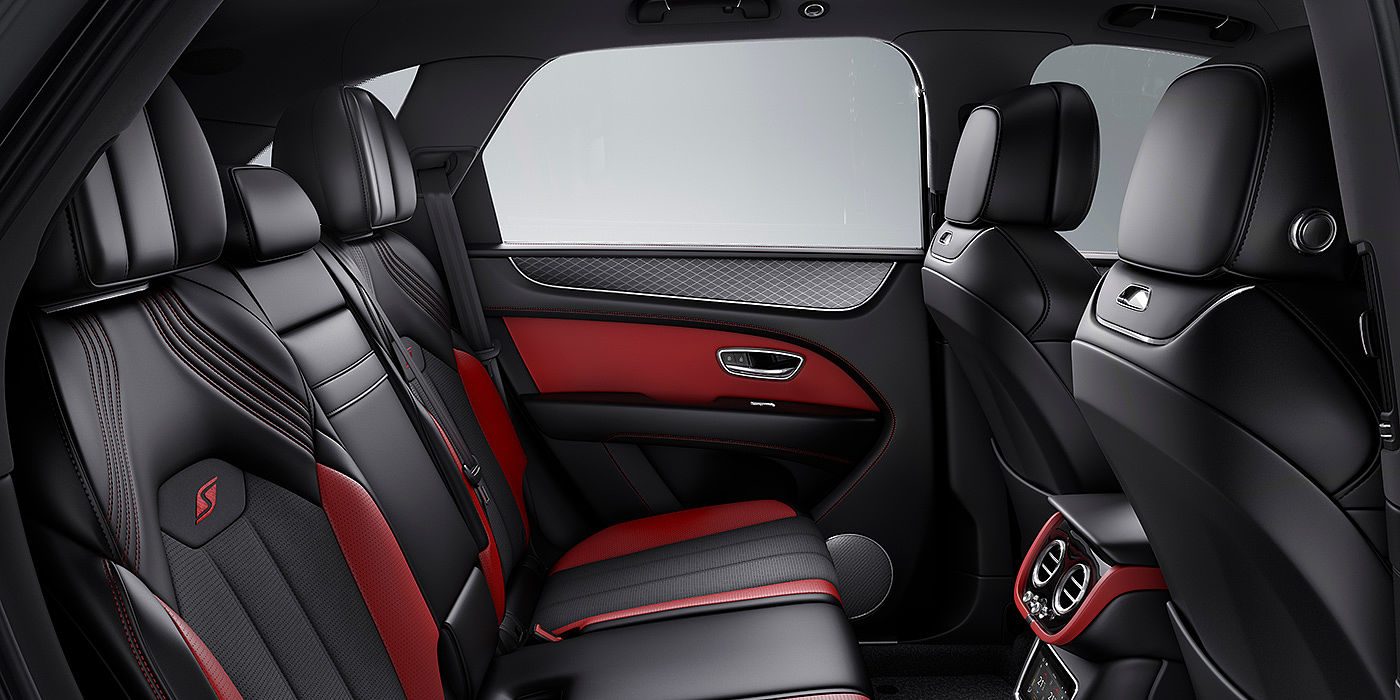 Bentley Johannesburg Bentey Bentayga S interior view for rear passengers with Beluga black and Hotspur red coloured hide.