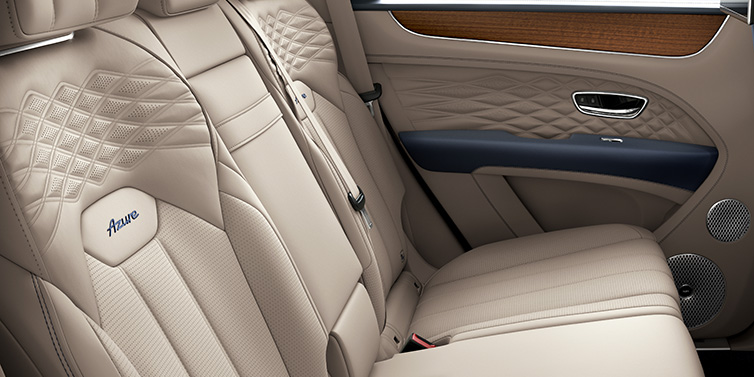 Bentley Johannesburg Bentley Bentayga Azure SUV rear interior in Portland and Imperial Blue hides and seat stitching featuring Azure seat emblem