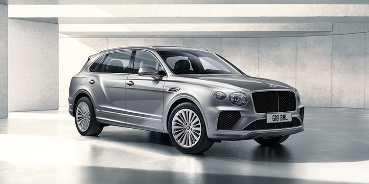 Bentley Johannesburg Bentley Bentayga Extended Wheelbase SUV front three quarter in Moonbeam paint with a grey background