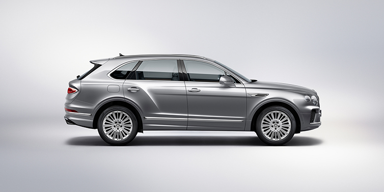 Bentley Johannesburg Bentley Bentayga SUV side profile in Moonbeam silver paint against white background featuring 21 inch 5 spoke wheels