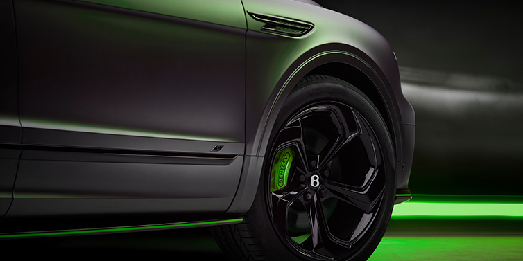 Bentley Johannesburg Bentley Bentayga S Black Edition SUV exterior wheel detail with Cyber Green brakes with Anthracite Satin paint