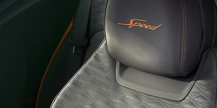 Bentley Johannesburg Bentley Continental GT Speed coupe seat detail in Gravity Grey hide and Speed emblem in Mandarin by Mulliner coloured embroidery