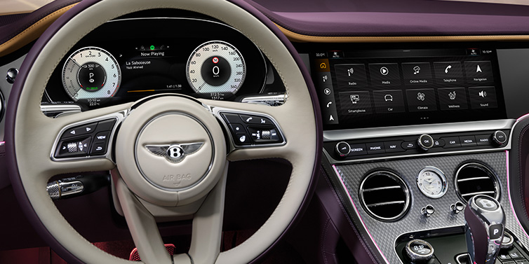 Bentley Johannesburg Bentley Continental GTC Mulliner convertible steering wheel and drivers screens surrounded by Damson purple and Linen hides